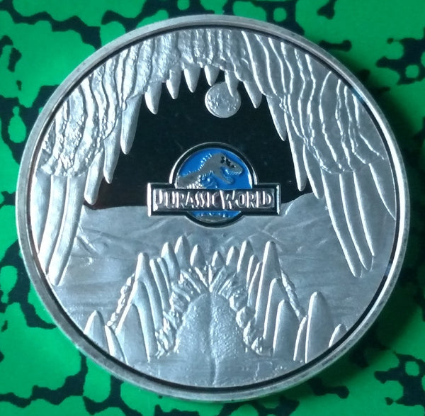 JURASSIC WORLD DINOSAUR COLORIZED SILVER/BRASS ART ROUND - COLLECTIBLE, NOT MINT ISSUED - 1